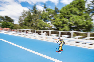 Low angle view of man skateboarding on road