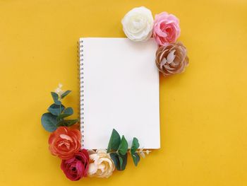 High angle view of roses on yellow rose