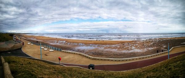 Panoramic view of beach against sky