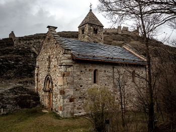 Low angle view of old building against sky