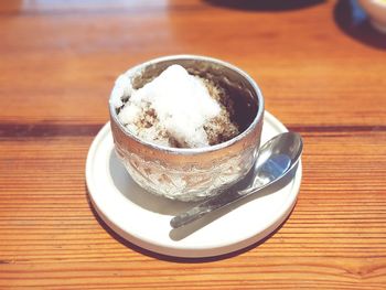 Close-up of coffee cup on table