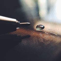 Close-up of cigarette on table