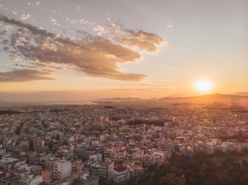 High angle view of townscape against sky during sunset