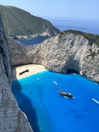 Scenic view of sea against mountain