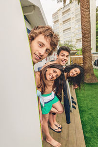 Portrait of smiling young friends