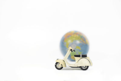 Close-up of toy car over white background