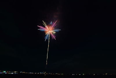 Low angle view of sky illumed with fire crackers