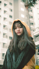 Portrait of young woman in winter