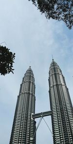 Low angle view of skyscrapers against sky