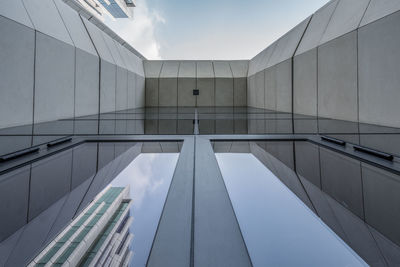 Low angle view of modern building against sky