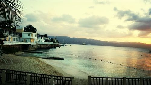 Scenic view of sea against cloudy sky
