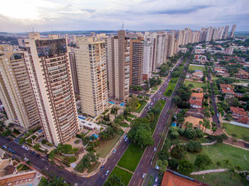 High angle view of street amidst buildings in city