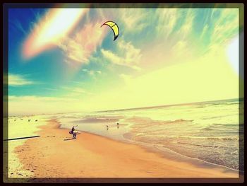 Scenic view of beach at sunset