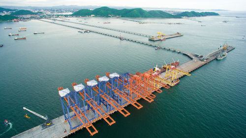 High angle view of commercial dock by sea