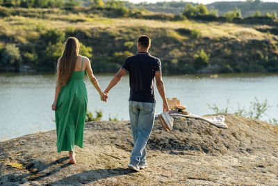 Budget-friendly cheap european honeymoon destinations. newlyweds couple in love on summer picnic