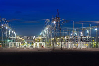 View of an electric substation at night