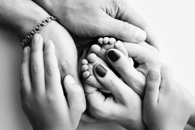 Cropped image of woman holding baby