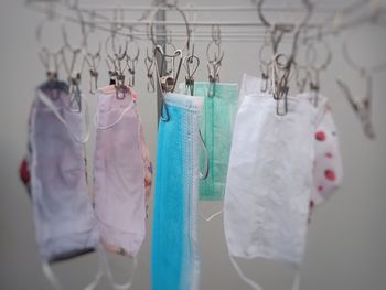 Close-up of clothes hanging on rack