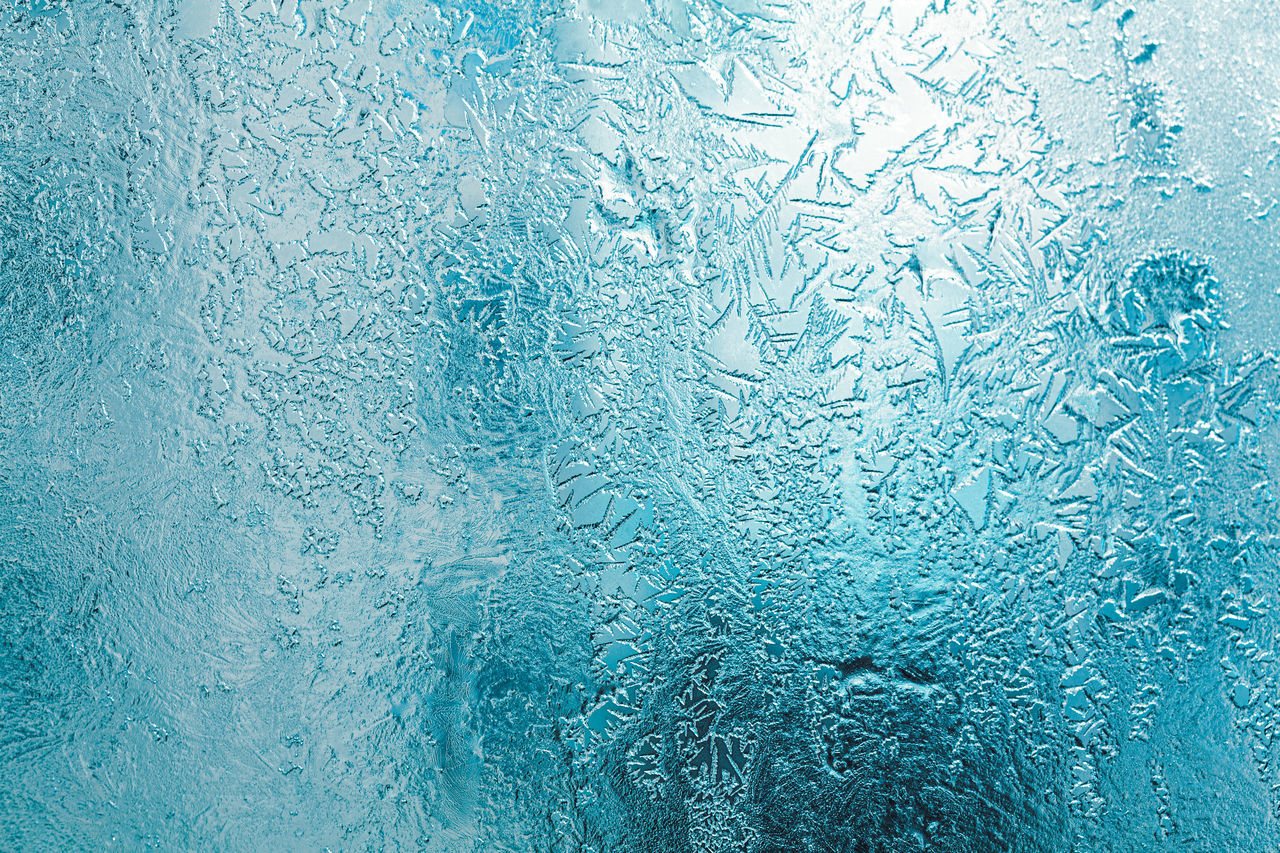 FULL FRAME SHOT OF GLASS WINDOW WITH ICE