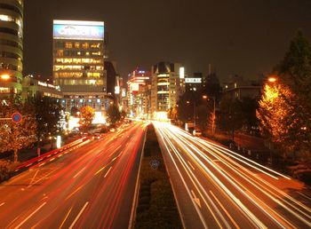 Light trails on city street at night