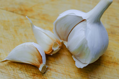 Close-up of garlic on cutting board