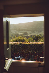 View of mountain and garden through stable door