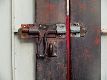 Close-up of old rusty metal door