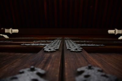 Low angle view of closed wooden door