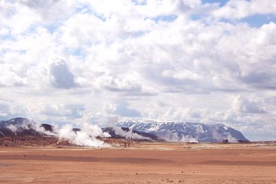 Landscape with snowcapped mountain in background