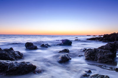 Scenic view of sea during sunset