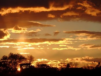 Scenic view of dramatic sky during sunset