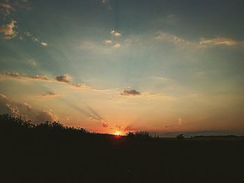 Scenic view of landscape at sunset