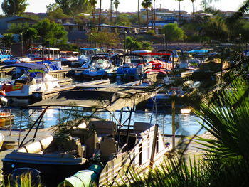 Boats moored at harbor