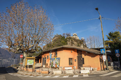 Beautiful building with a church in the background in the municipality of caldè on lake maggiore