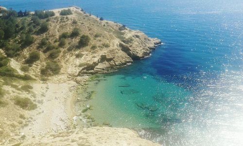 High angle view of beach against blue sky