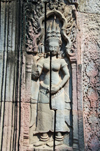 View of buddha statue against wall