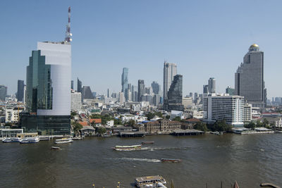 View of buildings in city at waterfront