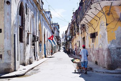 Narrow alley with buildings in background