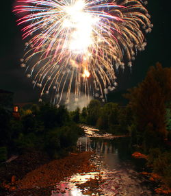 Firework display at night