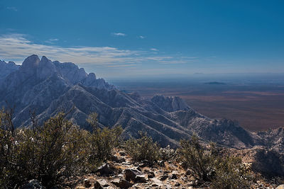 Aerial view of landscape and mountains against sky