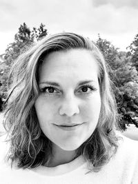 Close-up portrait of a smiling young woman