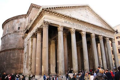 Tourists in front of historical building