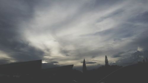 Built structure against cloudy sky