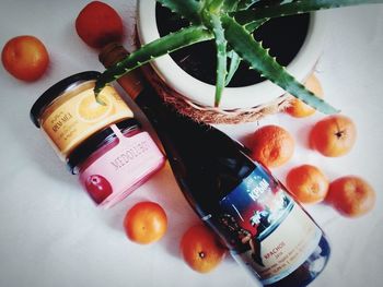 High angle view of fruits and coffee on table