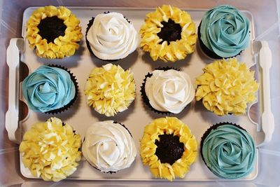 High angle view of cupcakes on flowers