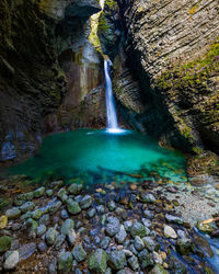 Scenic view of waterfall in forest