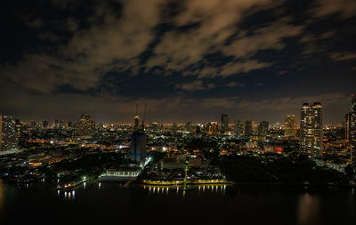Illuminated buildings in city at night