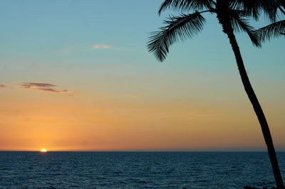Scenic view of sea against sky at sunset
