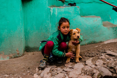 Portrait of happy girl with dog