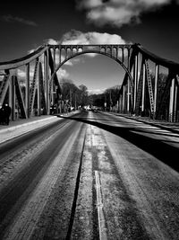 View of bridge against cloudy sky